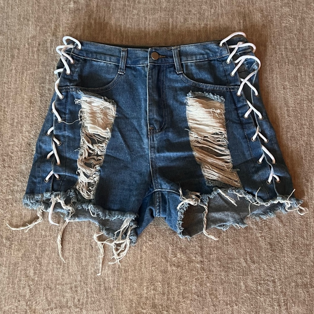 Distressed Blue Denim Shorts with Lace-Up Sides